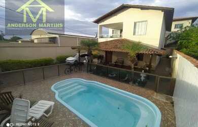 Imagem: A casa possui 5 Dormitórios, 5 Banheiros, 5 Vagas na garagem