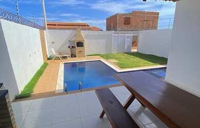 Imagem: A casa possui 3 Dormitórios, 1 Vaga na garagem e está localizado