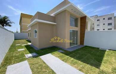 Imagem: A casa possui 3 Dormitórios, 2 Banheiros, 3 Vagas na garagem