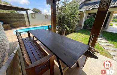 Imagem: A casa possui 2 Dormitórios, 2 Banheiros, 3 Vagas na garagem