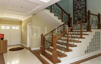 Imagem: A casa em condomínio possui 5 Dormitórios, 5 Banheiros, 5