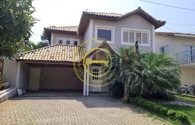 Imagem: A casa possui 4 Dormitórios, 4 Banheiros, 4 Vagas na garagem