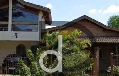 Imagem: A casa em condomínio possui 4 Dormitórios, 5 Banheiros, 3