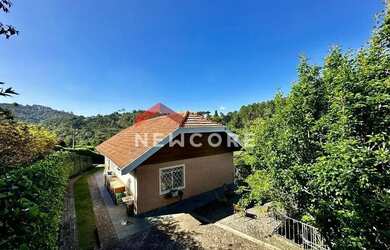 Imagem: A casa em condomínio possui 4 Dormitórios, 3 Banheiros, 4