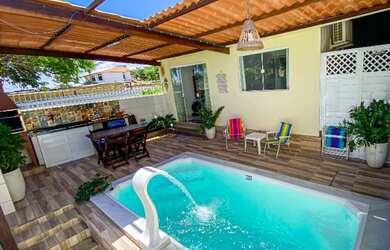 Imagem: A casa possui 3 Dormitórios e está localizado em Praia de