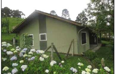 Imagem: A casa possui 2 Dormitórios, 1 Banheiro, 1 Vaga na garagem