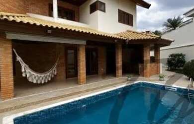 Imagem: A casa em condomínio possui 4 Dormitórios, 5 Banheiros, 5