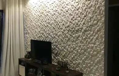 Imagem: A casa possui 3 Dormitórios, 2 Banheiros, 2 Vagas na garagem