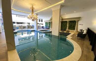 Imagem: O apartamento possui 4 Dormitórios, 5 Banheiros, 3 Vagas na