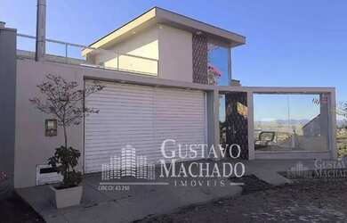 Imagem: A casa possui 4 Dormitórios, 4 Banheiros, 2 Vagas na garagem