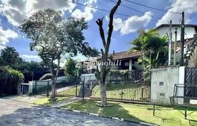 Imagem: A casa em condomínio possui 4 Dormitórios, 5 Banheiros, 5