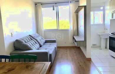 Imagem: O apartamento possui 2 Dormitórios, 1 Banheiro, 1 Vaga na garagem