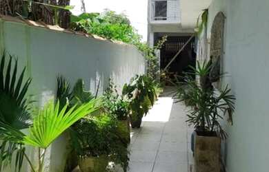 Imagem: A casa possui 4 Dormitórios, 3 Banheiros, 127m² de Área e