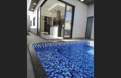 Imagem: A casa em condomínio possui 3 Dormitórios, 4 Banheiros, 2