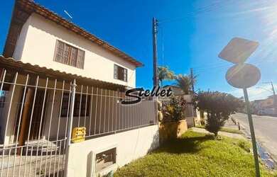 Imagem: A casa possui 2 Dormitórios, 2 Banheiros, 3 Vagas na garagem