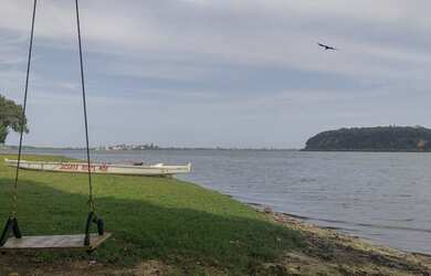 Imagem: A casa possui 1 Dormitório, 1 Vaga na garagem e está localizado