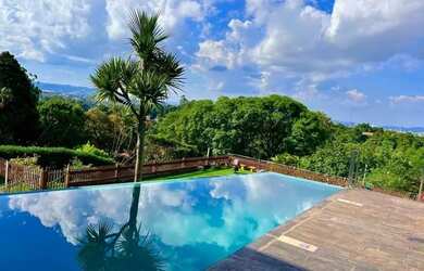 Imagem: A casa em condomínio possui 4 Dormitórios, 5 Banheiros, 5