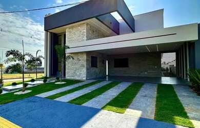 Imagem: A casa possui 4 Dormitórios, 4 Banheiros, 2 Vagas na garagem