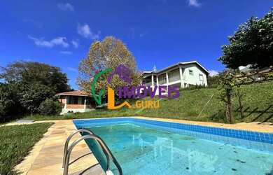 Imagem: A casa possui 3 Dormitórios, 5 Banheiros, 2 Vagas na garagem