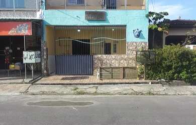 Imagem: A casa possui 3 Dormitórios, Acomodam 7 pessoas e está localizado