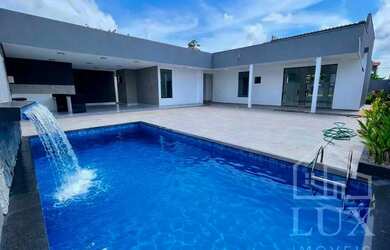 Imagem: A casa em condomínio possui 4 Dormitórios, 5 Banheiros, 5