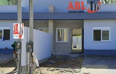 Imagem: A casa possui 3 Dormitórios, 2 Banheiros, 2 Vagas na garagem