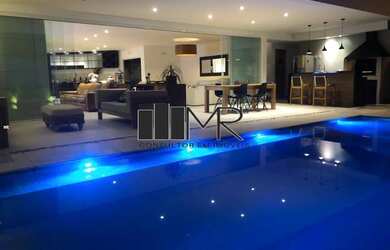 Imagem: A casa em condomínio possui 4 Dormitórios, 5 Banheiros, 5