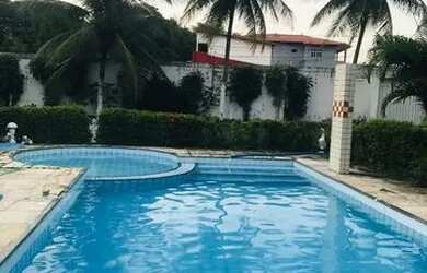 Imagem: A casa possui 4 Dormitórios, 5 Banheiros, 5 Vagas na garagem