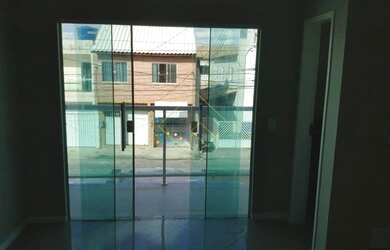 Imagem: A casa possui 2 Dormitórios, 3 Banheiros, 2 Vagas na garagem