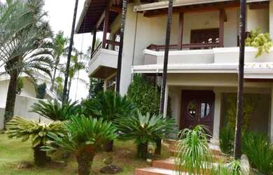 Imagem: A casa em condomínio possui 4 Dormitórios, 5 Banheiros, 4