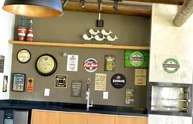 Imagem: A casa possui 4 Dormitórios, 4 Banheiros, 4 Vagas na garagem