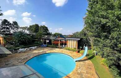 Imagem: A casa em condomínio possui 4 Dormitórios, 5 Banheiros, 5