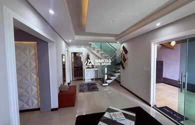 Imagem 4: Vendo casa de 5/4 sendo 02 suítes com 03 salas e 03 vagas de uso mixto...