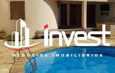 Imagem: A casa possui 4 Dormitórios, 5 Banheiros, 3 Vagas na garagem