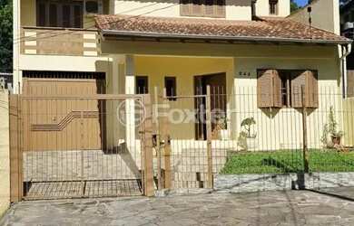 Imagem: A casa possui 5 Dormitórios, 4 Banheiros, 5 Vagas na garagem