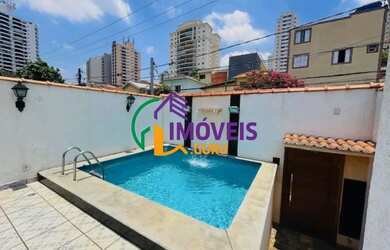 Imagem: A casa possui 3 Dormitórios, 5 Banheiros, 3 Vagas na garagem