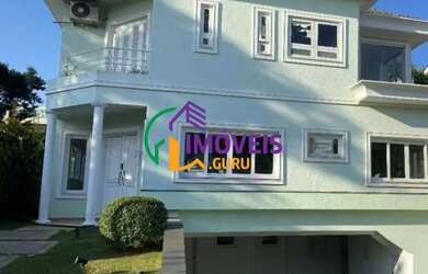 Imagem: A casa em condomínio possui 4 Dormitórios, 5 Banheiros, 4