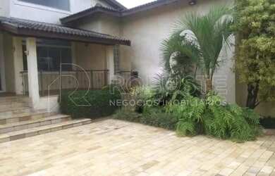 Imagem: A casa possui 4 Dormitórios, 5 Banheiros, 5 Vagas na garagem