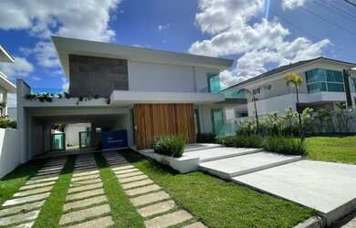 Imagem: A casa em condomínio possui 5 Dormitórios, 5 Banheiros, 4