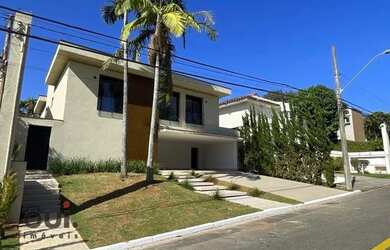 Imagem: A casa possui 4 Dormitórios, 5 Banheiros, 5 Vagas na garagem