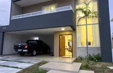 Imagem: A casa possui 3 Dormitórios, 3 Banheiros, 4 Vagas na garagem