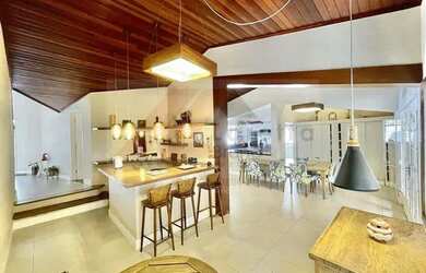 Imagem: A casa possui 3 Dormitórios, 5 Banheiros, 5 Vagas na garagem