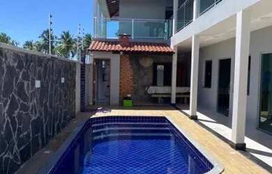 Imagem: A casa possui 5 Dormitórios, 2 Vagas na garagem e está localizado