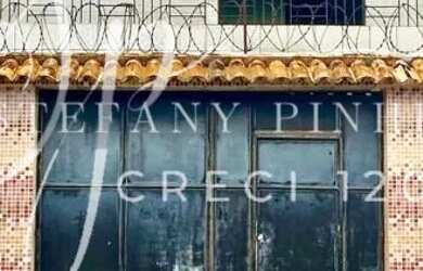 Imagem: A casa possui 3 Dormitórios, 1 Banheiro, 1 Vaga na garagem