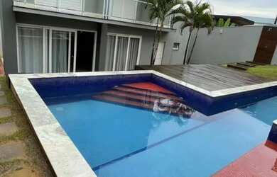 Imagem: A casa em condomínio possui 4 Dormitórios, 4 Banheiros, 2