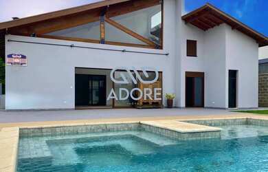 Imagem: A casa em condomínio possui 5 Dormitórios, 5 Banheiros, 5