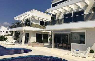 Imagem: A casa em condomínio possui 5 Dormitórios, 5 Banheiros, 1.000m²