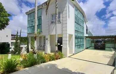 Imagem: A casa possui 5 Dormitórios, 5 Banheiros, 5 Vagas na garagem