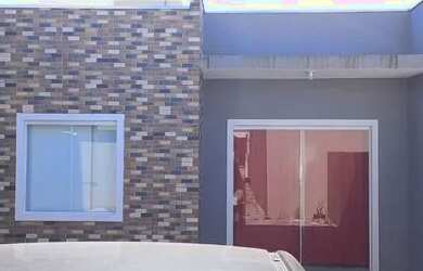 Imagem: A casa possui 2 Dormitórios, 2 Vagas na garagem e está localizado