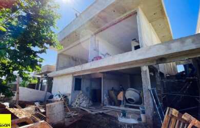 Imagem: A casa em condomínio possui 3 Dormitórios, 2 Banheiros, 2